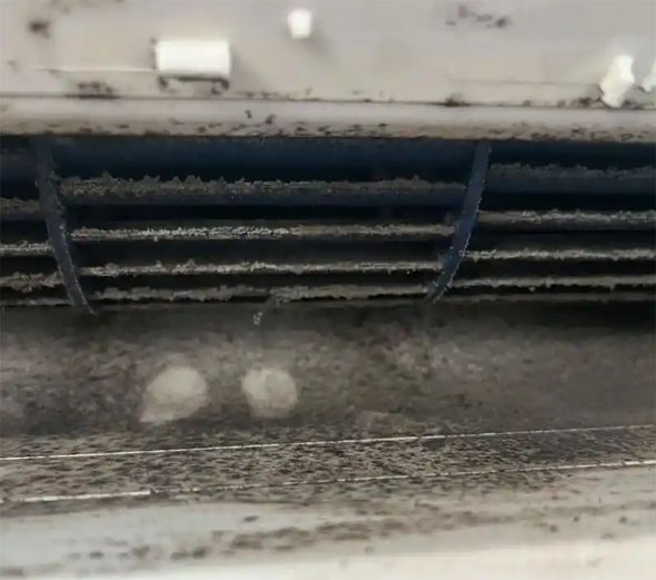 潍坊市空调吹的风有股烧焦味是怎么回事